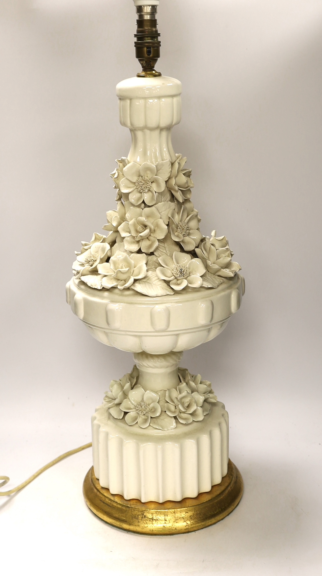 A large floral column table lamp on circular gilt base, 64cm high including the fitting